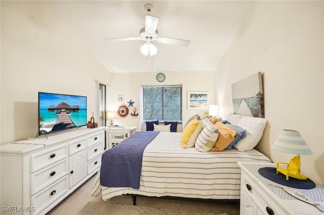 carpeted bedroom with ceiling fan and lofted ceiling