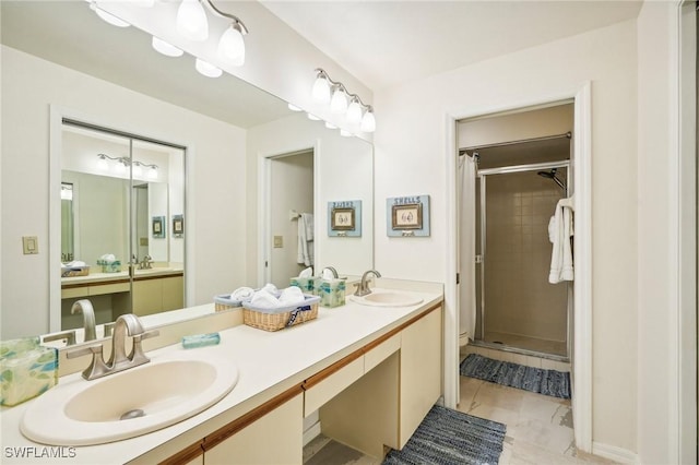 bathroom featuring tile patterned flooring, vanity, and walk in shower