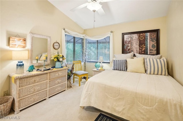 carpeted bedroom with ceiling fan and lofted ceiling