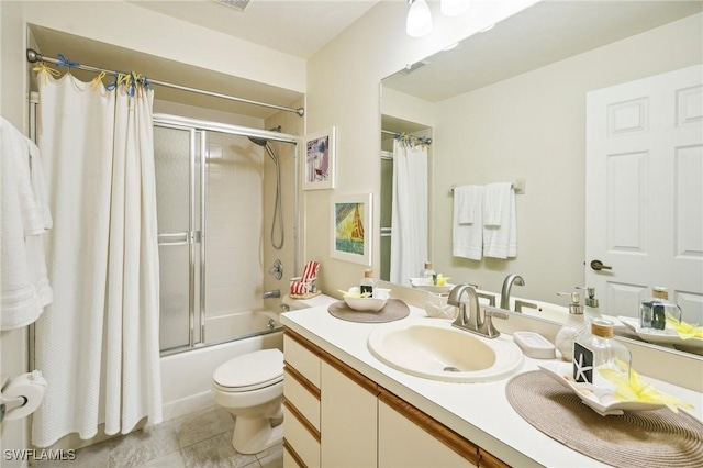 full bathroom with vanity, tile patterned floors,  shower combination, and toilet