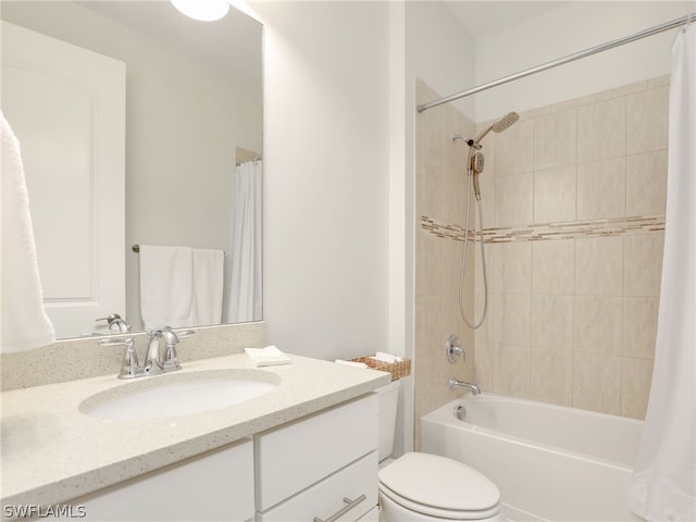 full bathroom with shower / bathtub combination with curtain, toilet, and vanity with extensive cabinet space