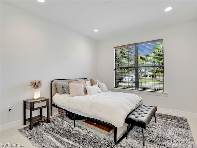 bedroom featuring multiple windows