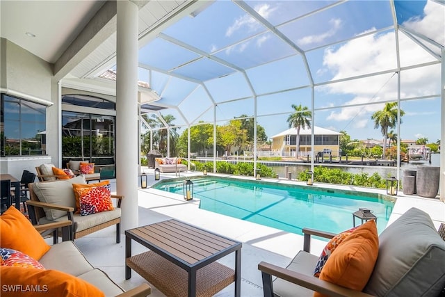 outdoor pool with a patio area, glass enclosure, and an outdoor living space