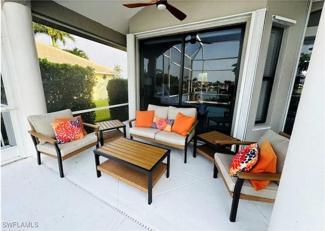 view of patio featuring outdoor lounge area and a ceiling fan