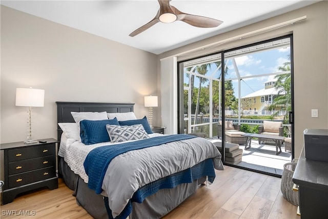 bedroom featuring light wood finished floors, access to outside, and ceiling fan