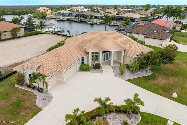 bird's eye view with a water view