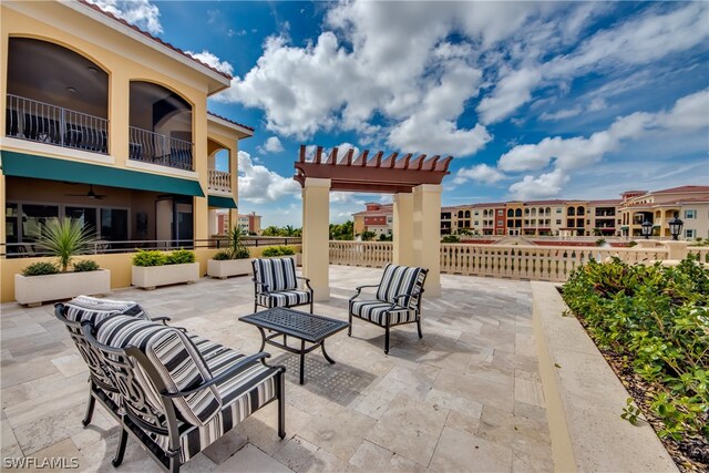 view of patio / terrace with a balcony