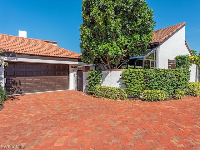 view of front of home featuring a garage