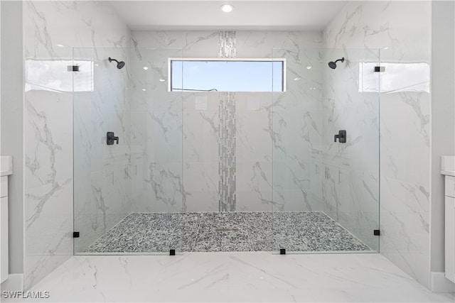 bathroom featuring vanity and walk in shower