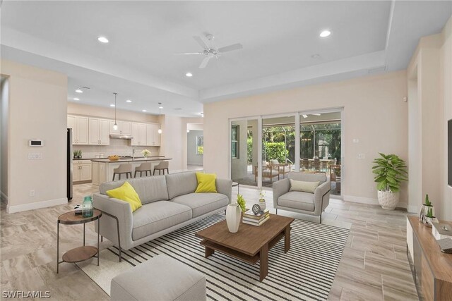 living room with ceiling fan