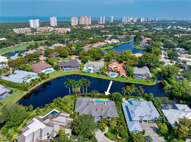 drone / aerial view with a water view