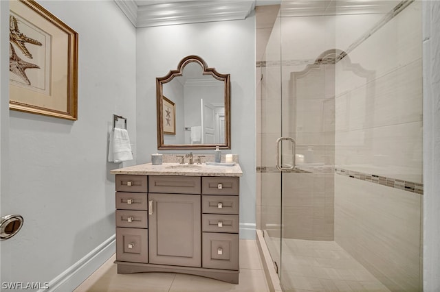 bathroom with vanity, tile patterned floors, walk in shower, and crown molding