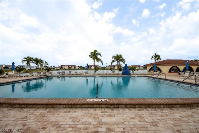 community pool featuring a patio