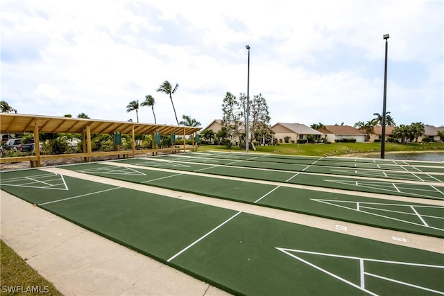 view of property's community with shuffleboard