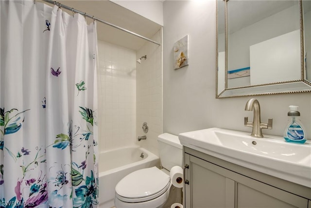 full bath featuring toilet, shower / tub combo, and vanity