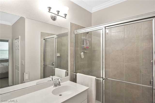 ensuite bathroom with a shower stall, crown molding, vanity, and connected bathroom