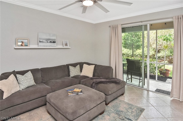 tiled living room with ceiling fan and ornamental molding