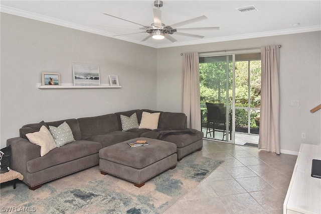 living room featuring ceiling fan, crown molding, and tile patterned flooring