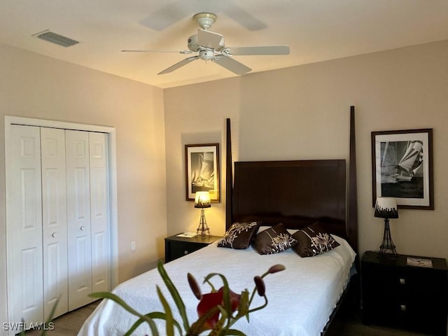 bedroom featuring ceiling fan and a closet