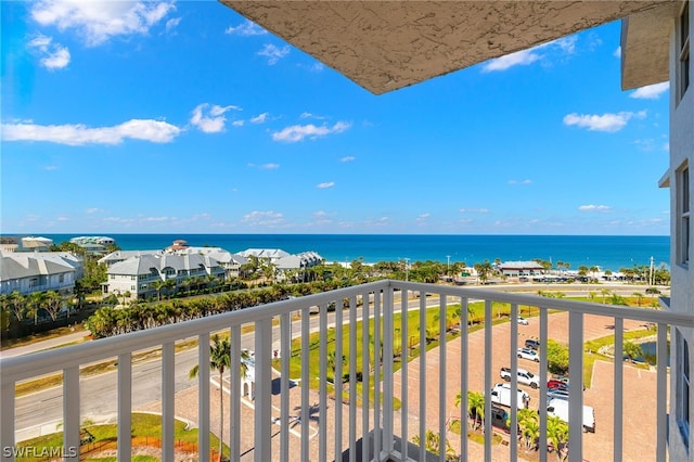 balcony featuring a water view