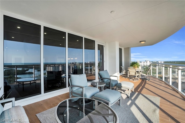 balcony featuring a water view