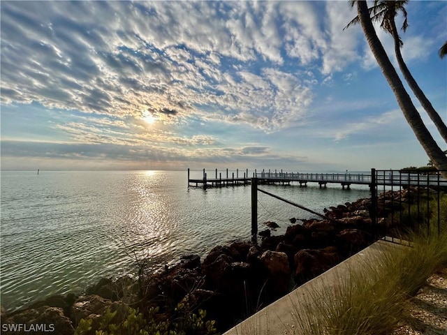 dock area featuring a water view