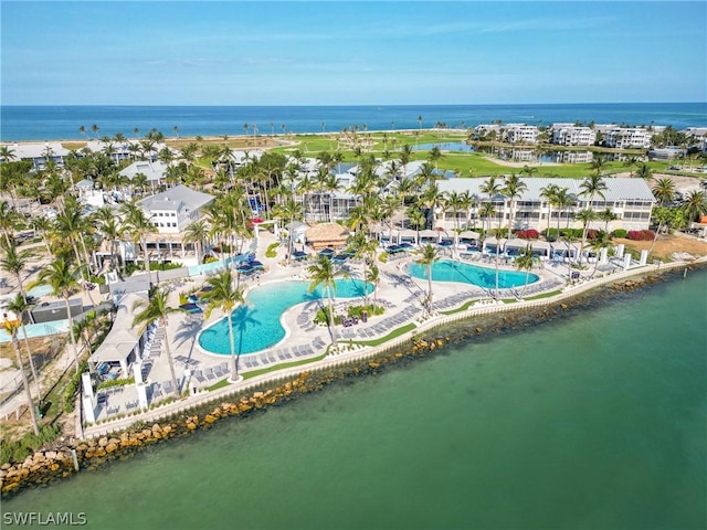 birds eye view of property featuring a water view