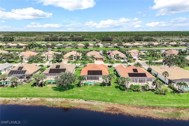birds eye view of property featuring a residential view and a water view
