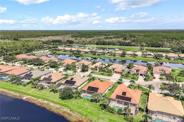 aerial view with a residential view and a water view