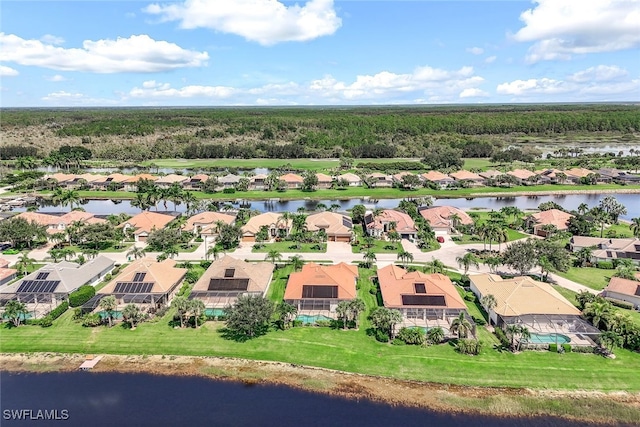 bird's eye view with a residential view and a water view