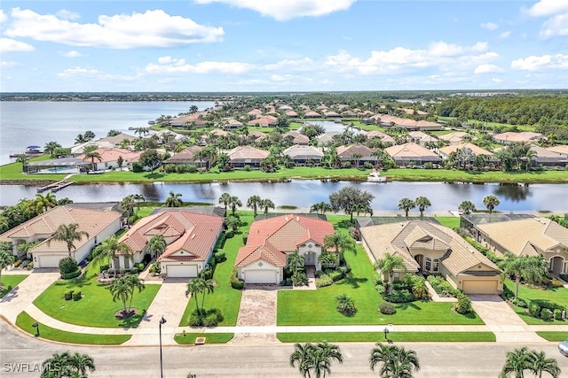 drone / aerial view featuring a water view