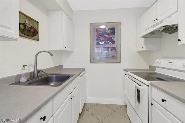 kitchen with white cabinets, sink, white appliances, and light tile floors