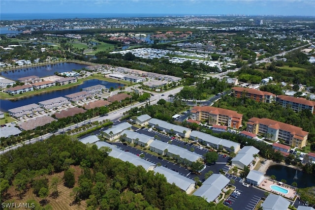 bird's eye view with a water view