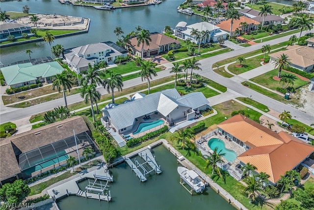 bird's eye view with a water view