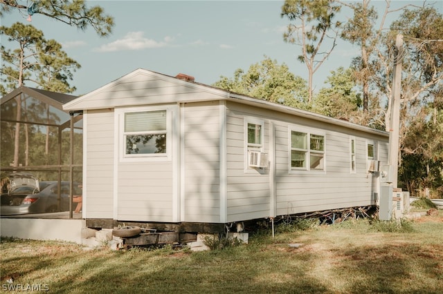 view of outdoor structure with a lawn