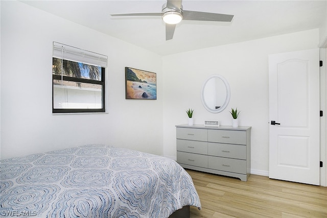 bedroom featuring ceiling fan and light hardwood / wood-style flooring