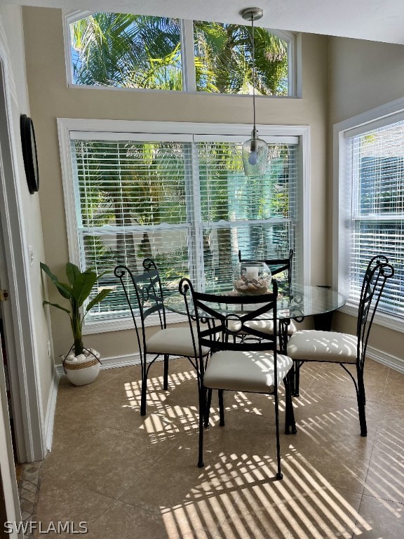 dining area featuring tile flooring