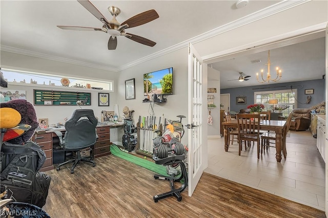 tiled home office featuring ceiling fan with notable chandelier and crown molding