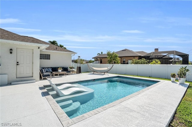 view of swimming pool with a patio area and an outdoor hangout area