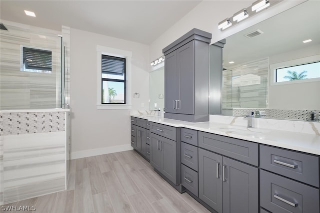 bathroom with dual bowl vanity