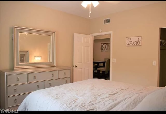 bedroom featuring a closet and a spacious closet