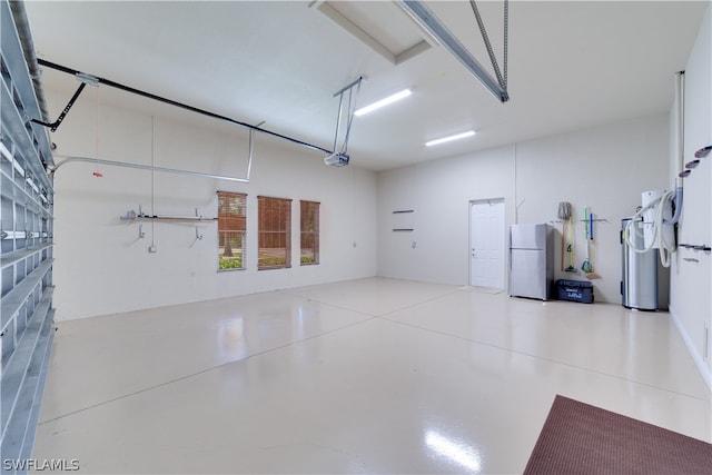 garage featuring stainless steel fridge