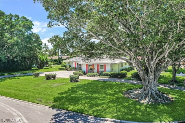 view of front of property with a front lawn