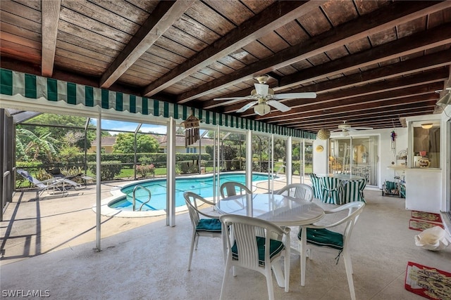 view of swimming pool featuring ceiling fan