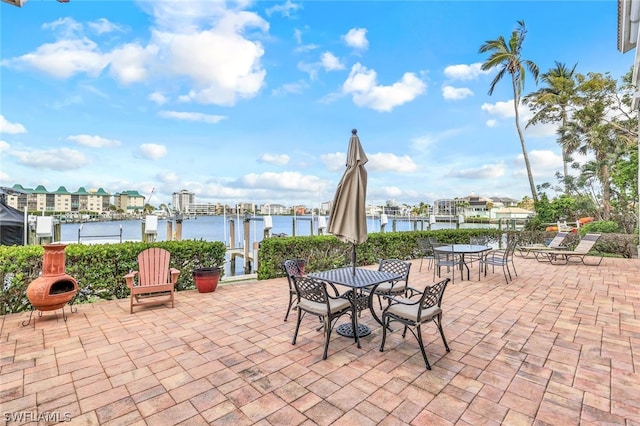 view of patio / terrace with a water view