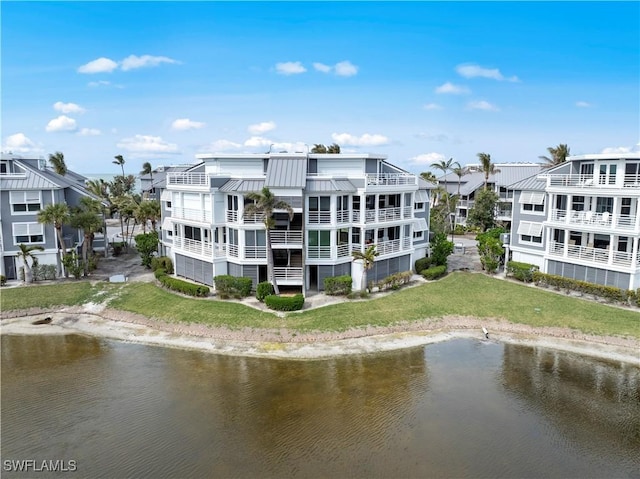 exterior space with a water view