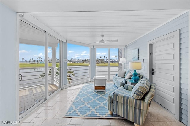 sunroom / solarium with ceiling fan