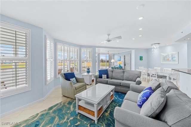 tiled living room with ceiling fan