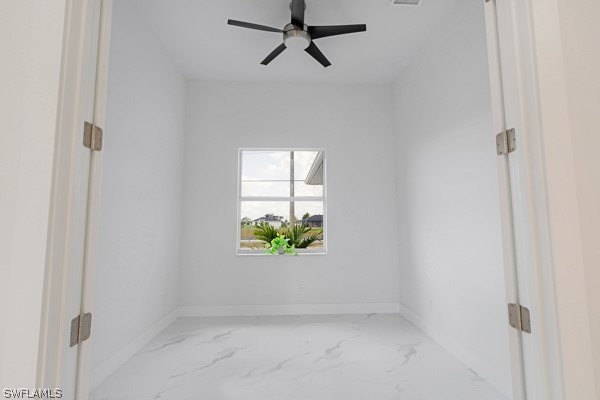 unfurnished room with ceiling fan