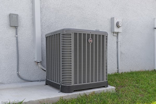 exterior details featuring cooling unit